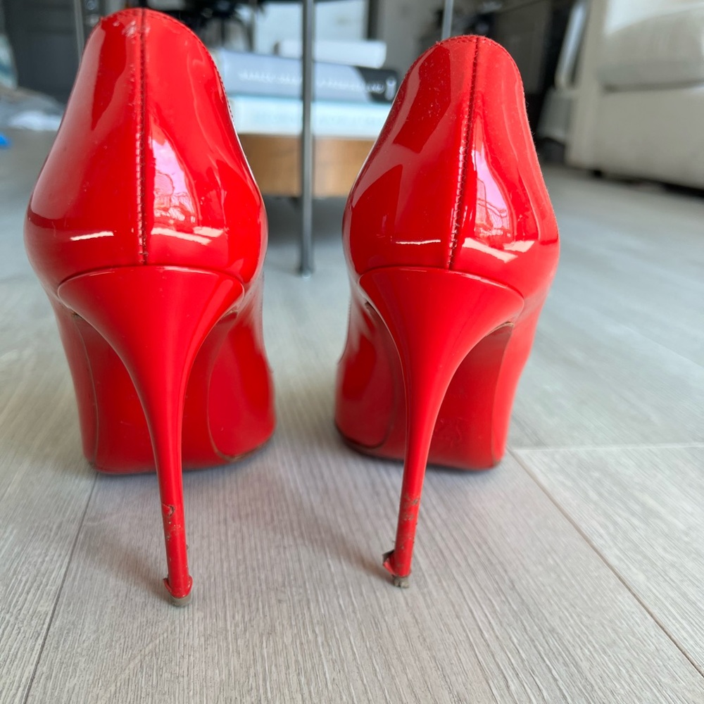 Red Red bottoms. Authentic. Box and Dust cover